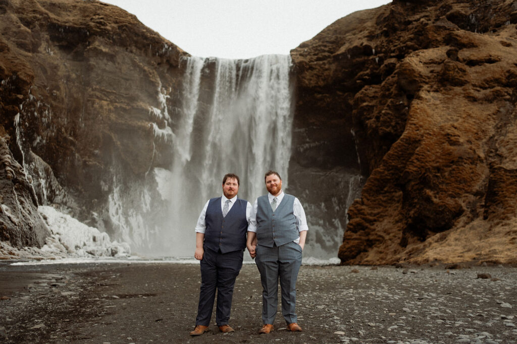 bride lovingly looks at groom during iceland wedding ceremony