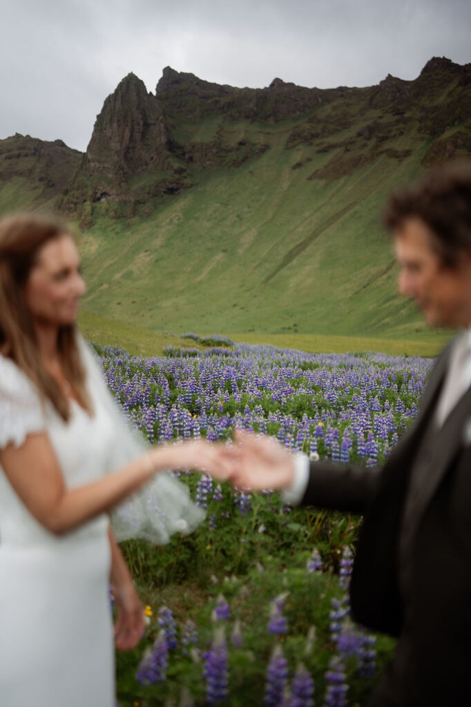 newlywed couple poses for iceland wedding photographer during iceland adventure elopement.