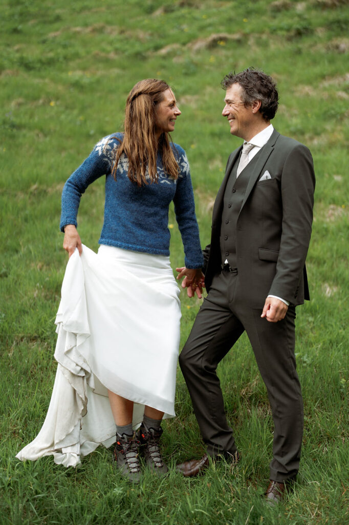 bride and groom pose for iceland wedding photographer during adventure elopement.