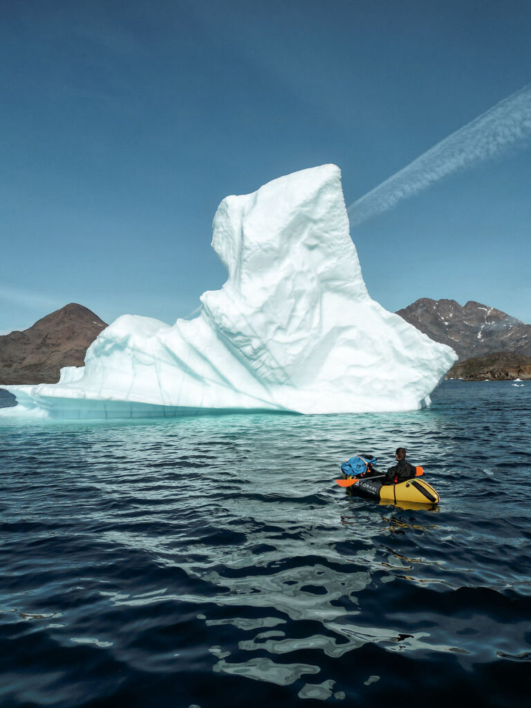 iceland elopement photographer kayaks in greenland while finding elopement locations.