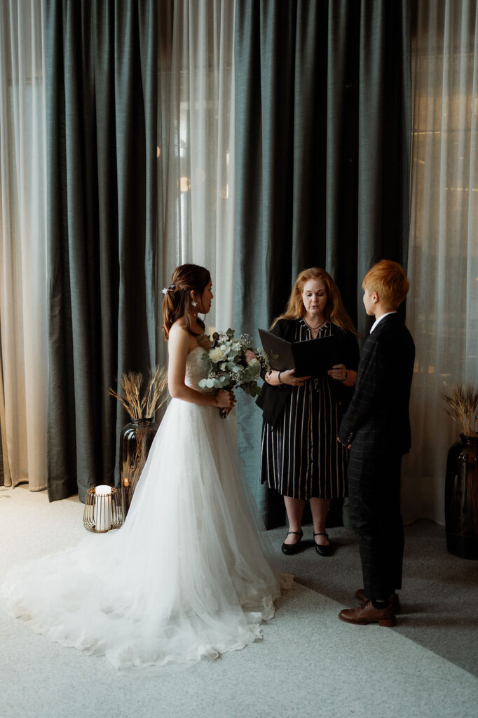 lgbtqi+ couple during their iceland destination wedding ceremony.