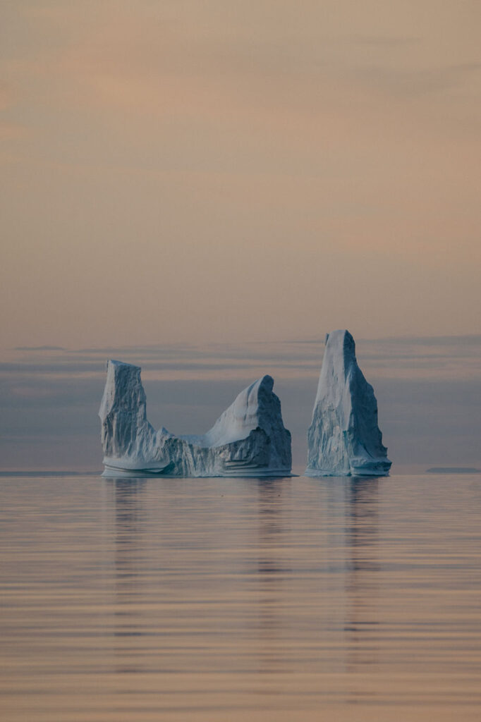 glaciers at sunset during adventure elopement in greenland.