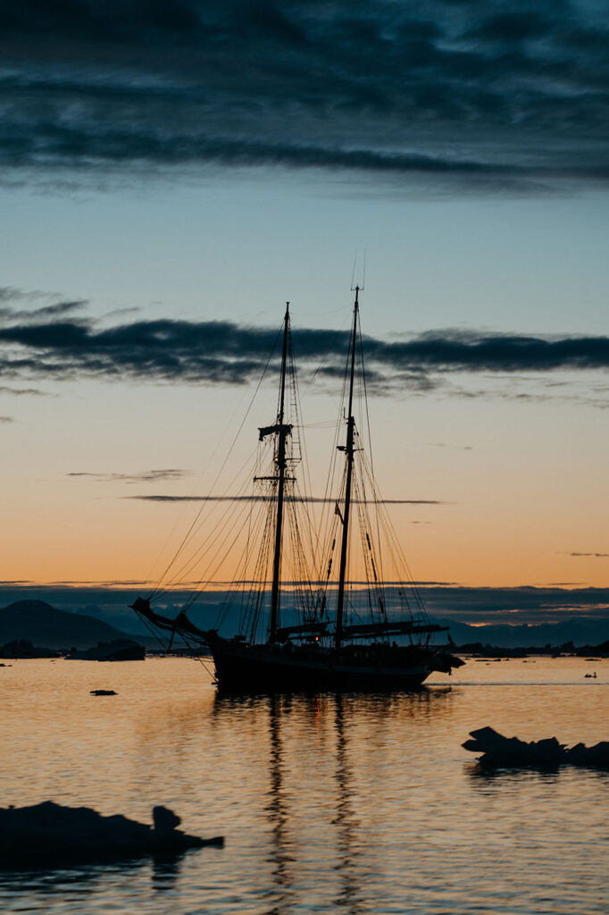 sailboat goes through greenland during adventure elopement.
