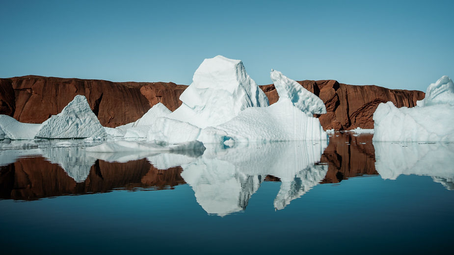 glaciers on the coast of greenland during destination elopement.