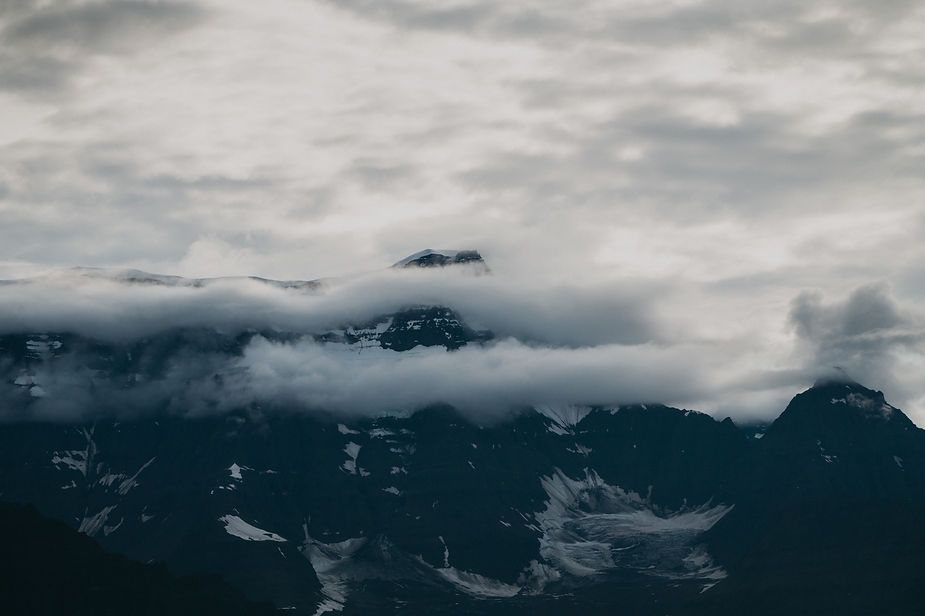 greenland mountains in the clouds during adventure elopement.