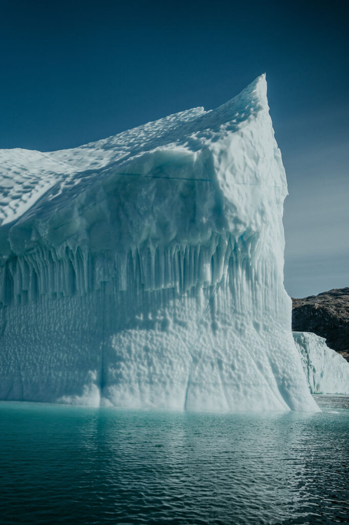giant glacier during destination wedding in greenland.