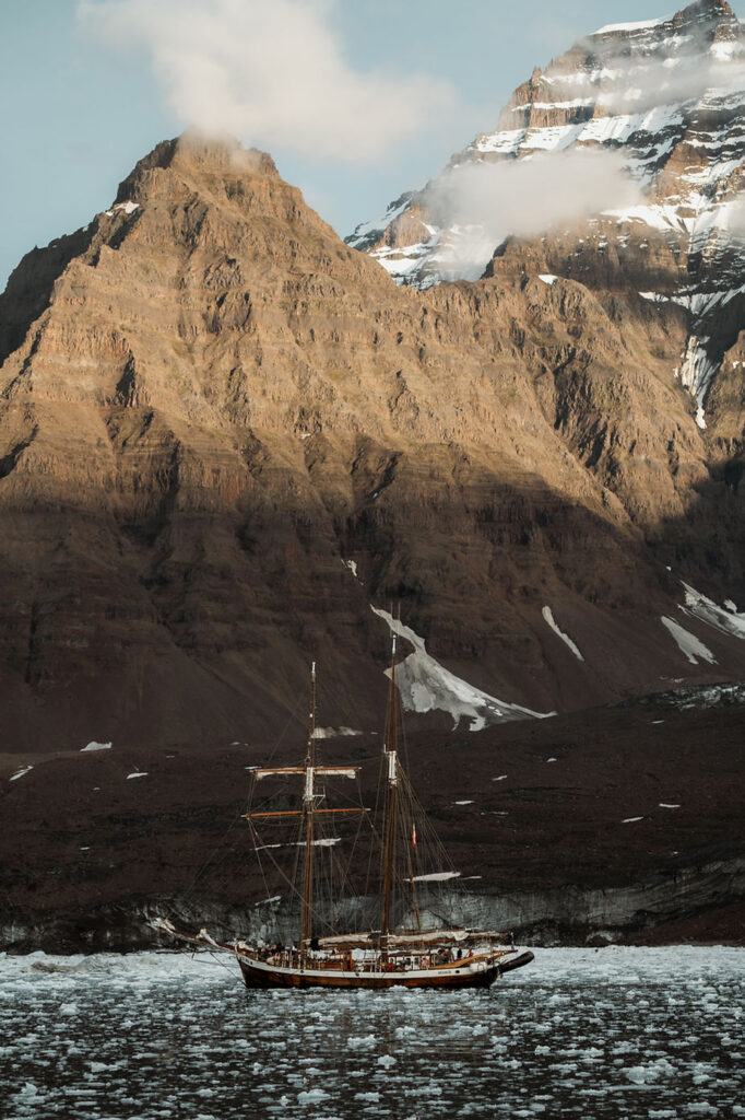 sailboat goes through greenland during adventure elopement.