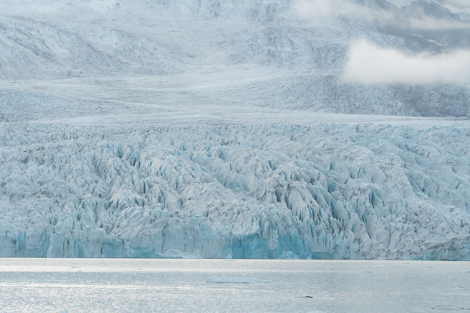 Iceland wedding photographer takes photo of glacier during iceland elopement.