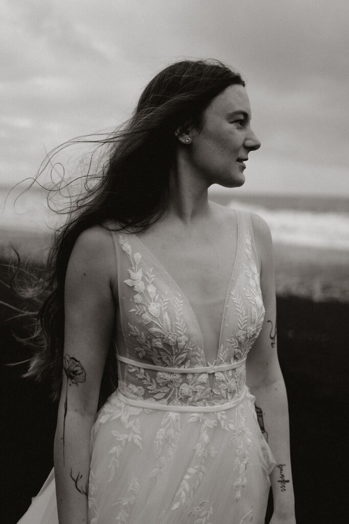 bride poses for iceland wedding photographer.