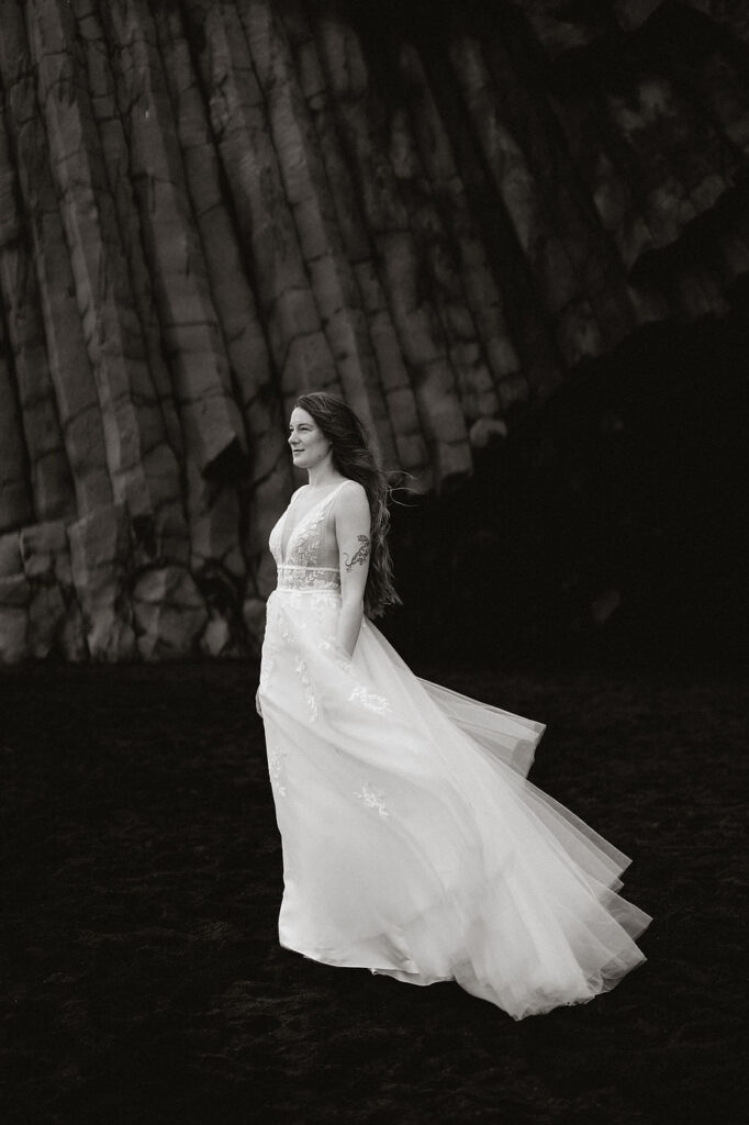 bride poses for iceland elopement photographer.