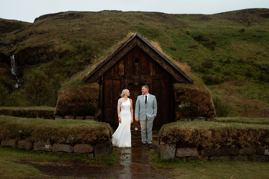 bride and groom pose for iceland elopement photographer.
