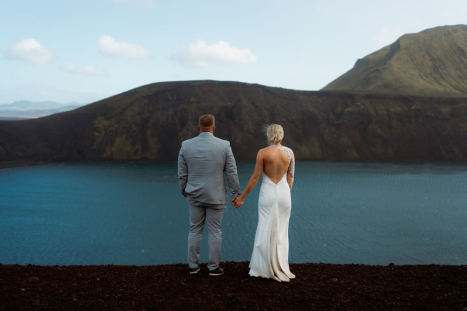 bride and groom pose for iceland wedding photographer.
