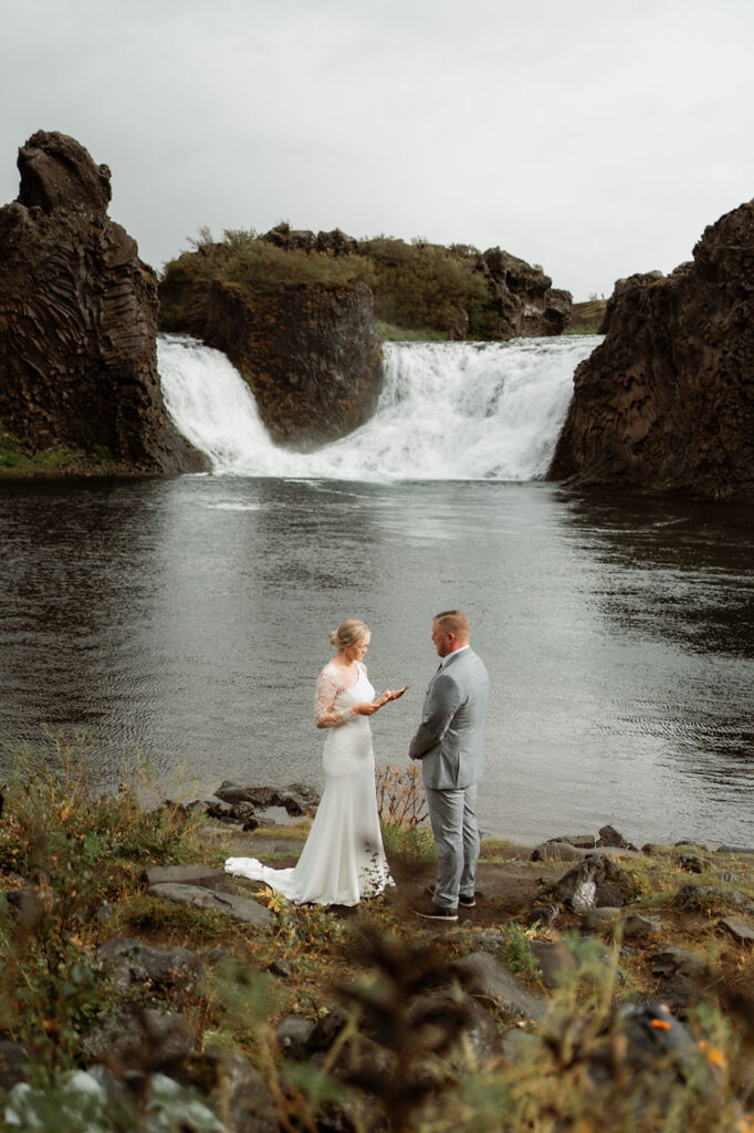 Bride and groom get married during their iceland elopement adventure.