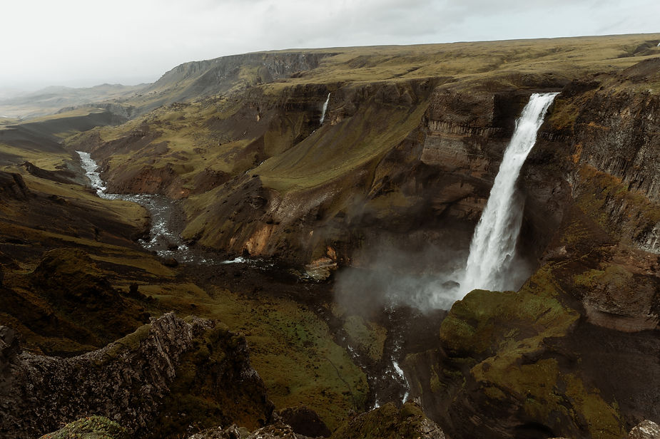 vast valley in iceland with waterfalls.