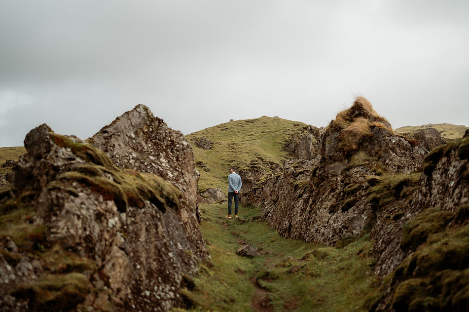 man waits for bride to do a first look during their iceland elopement.