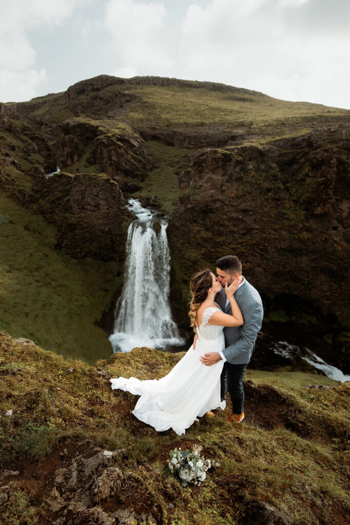 bride and groom pose for iceland elopement photographer.